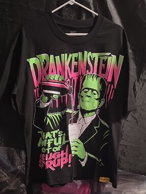 "That's A Awful Lot Of Cough Syrup" Graphic Tee by Desto Dubb - Black